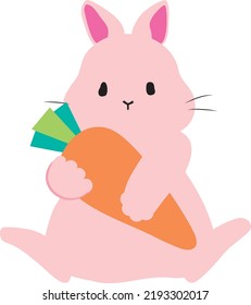 a rabbit is sitting holding a carrot.