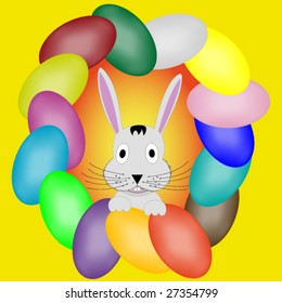 Rabbit that appears by a frame of colored eggs