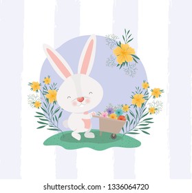 rabbit and wheelbarrow with flowers in the garden