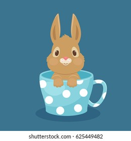 Rabbit/bunny sitting in a cup. Vector art. EPS 10