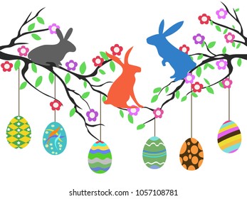 rabbits on easter eggs tree
