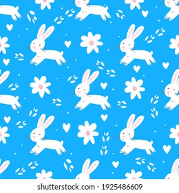 Los conejos son blancos con un fondo azul con pistas.Patrón para tarjetas de felicitación, decoración, textil, tela, fondo, papel envolvente.