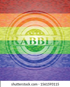Rabble emblem on mosaic background with the colors of the LGBT flag
