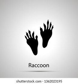 Raccoon paws, steps imprints, simple black silhouette on gray