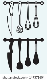 Rack of kitchen utensils isolated on blue background