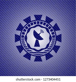 radar icon inside badge with denim background