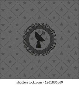radar icon inside black emblem