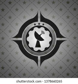 radar icon inside black emblem