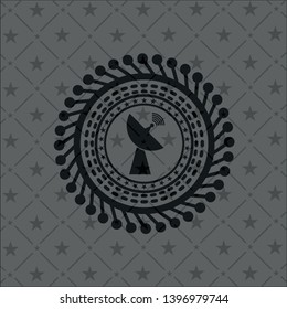 radar icon inside black emblem