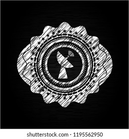 radar icon inside chalk emblem
