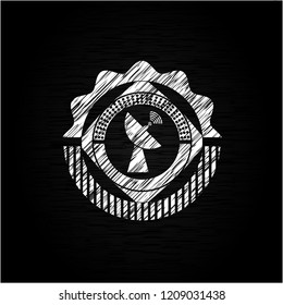 radar icon inside chalk emblem written on a blackboard