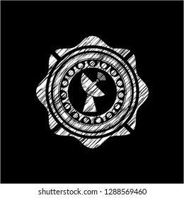 radar icon inside chalk emblem written on a blackboard