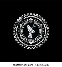 radar icon inside chalk emblem written on a blackboard