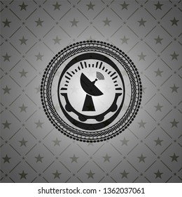 radar icon inside dark badge or emblem