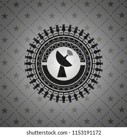 radar icon inside dark emblem