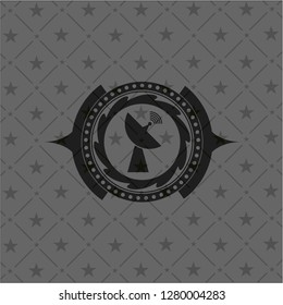 radar icon inside dark emblem