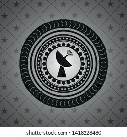 radar icon inside dark emblem