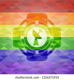 radar icon inside emblem on mosaic background with the colors of the LGBT flag