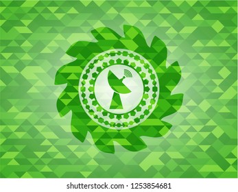 radar icon inside green emblem. Mosaic background