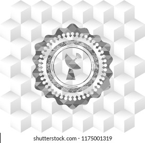 radar icon inside grey badge with geometric cube white background