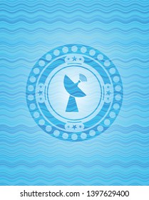radar icon inside light blue water wave emblem background.