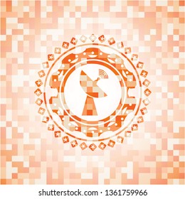 radar icon inside orange mosaic emblem