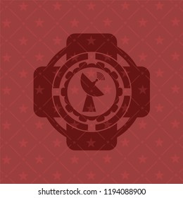 radar icon inside red emblem