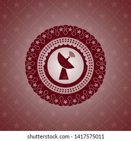 radar icon inside red emblem