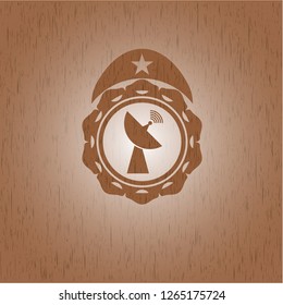 radar icon inside retro wooden emblem