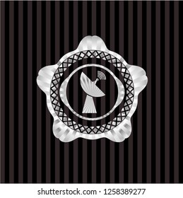 radar icon inside silver emblem or badge
