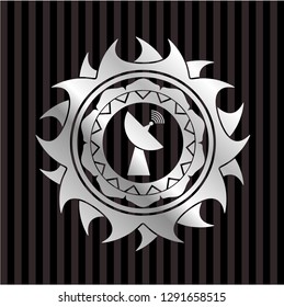 radar icon inside silver emblem or badge