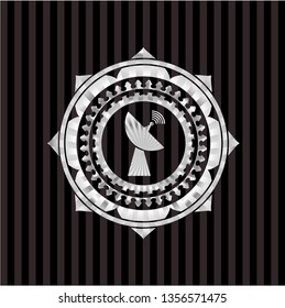 radar icon inside silver emblem