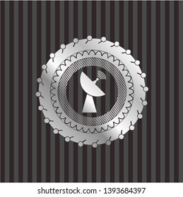 radar icon inside silver emblem