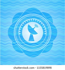 radar icon inside sky blue water emblem.