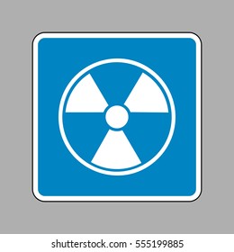 Radiation Round sign. White icon on blue sign as background.