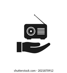Radio on hand flat icon isolated on white background. Vector illustration