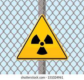 radioactive warning sign on wire fence