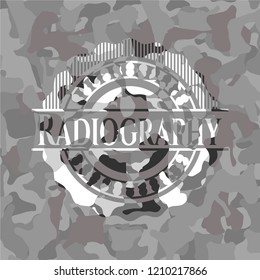 Radiography written on a grey camouflage texture