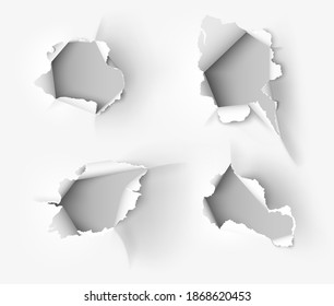 ragged Hole torn in ripped paper on white background