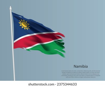 Ragged national flag of Namibia. Wavy torn fabric on blue background. Realistic vector illustration