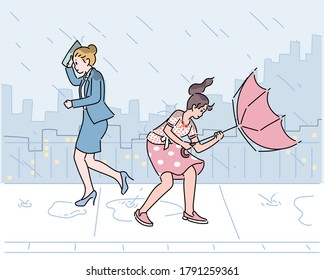 The rain is blowing and the umbrella is turning over. hand drawn style vector design illustrations. 