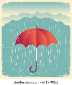 Rain cloud with red umbrella .Vintage poster on old paper for design