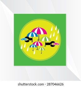 rain drop with umbrella over green background 