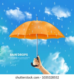 Rain drops realistic poster with people hand holding open orange umbrella on cloudy sky background vector illustration