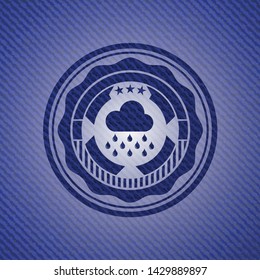 rain icon inside badge with denim texture