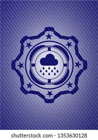 rain icon inside badge with jean texture