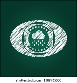 rain icon inside chalk emblem written on a blackboard