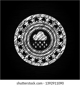 rain icon inside chalkboard emblem on black board