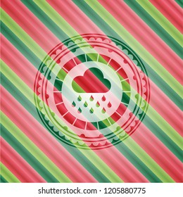 rain icon inside christmas style badge..