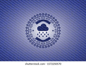 rain icon inside denim background